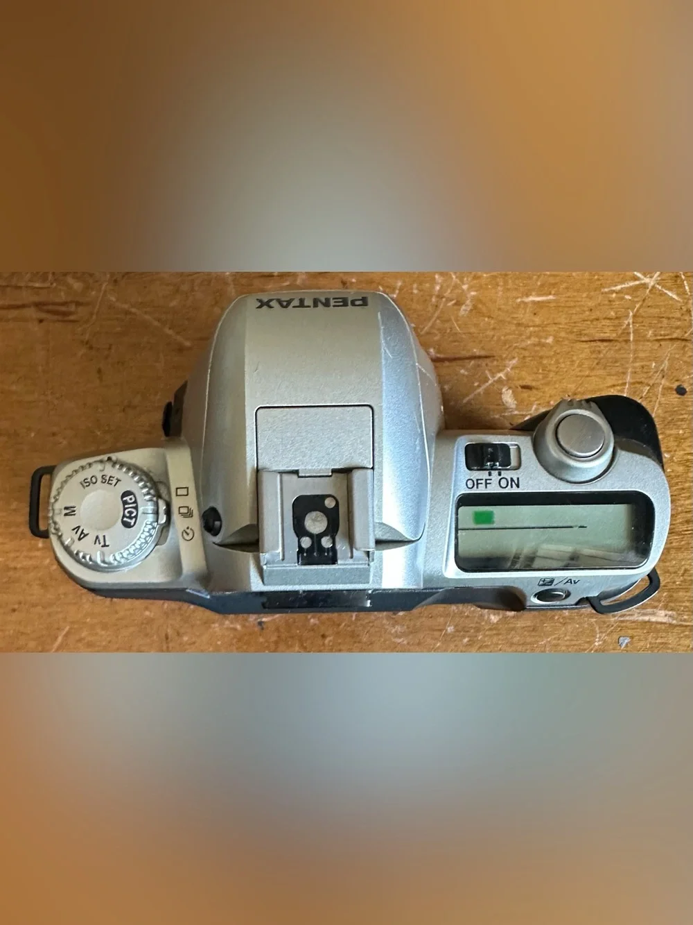 Pentax Silver SLR Camera Body with White Lens Cap